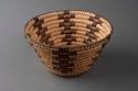 Coiled cattail reed open weave bowl