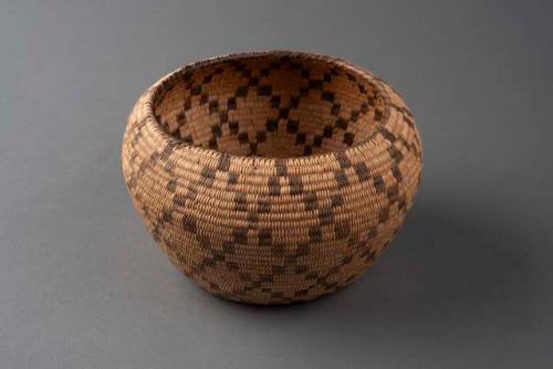 Coiled cattail reed globular bowl with diamond motif