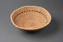 Twined circular tray-shaped basket with flaring sides