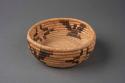 Coiled bowl-shaped basket with bird motif