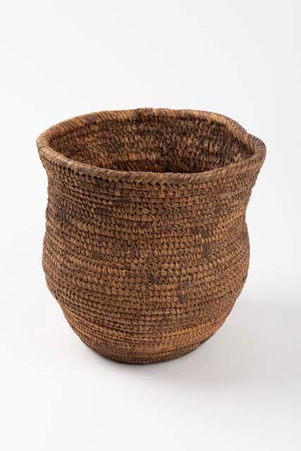 Locust food in closely woven fibre basket container ("nsanani")