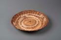 Wicker tray basket - design predominates in brown, white and red