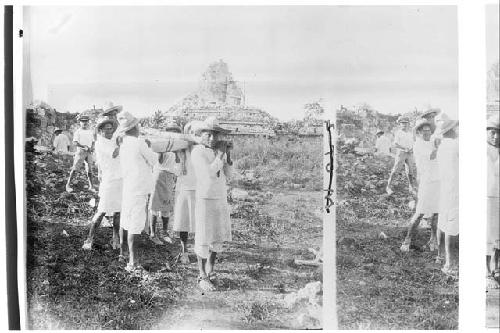 Workmen carrying stone from the Temple of Wall Panels