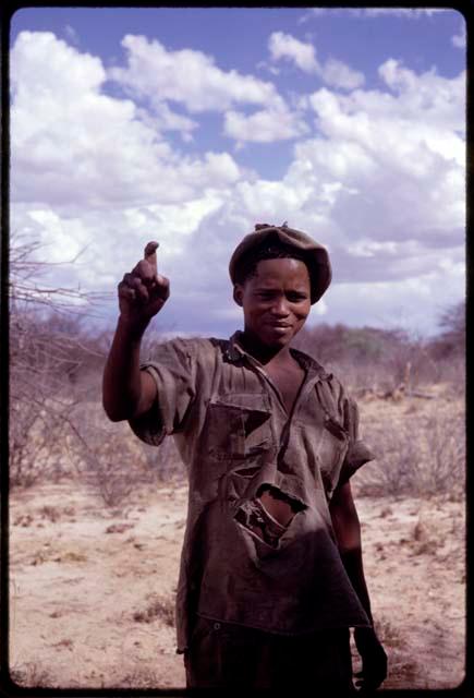 N!o (brother of !Ani) demonstrating hunting hand signal for 'kudu'