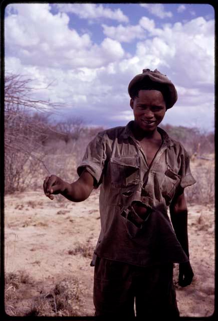 N!o (brother of !Ani) demonstrating hunting hand signal