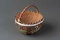 Painted coconut shell basket made by a school child