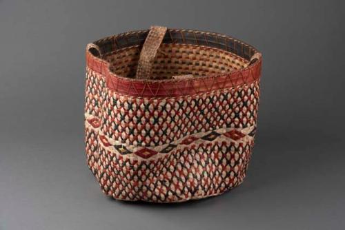 Large carrying basket, hexagonal bottom. Geometric design in red, black +