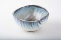 Bowl, ceramic, ring base, rounded sides grooved and pinched, streaked glaze