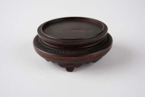 Carved wooden stand for small covered jar (E3348)