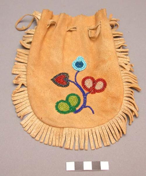 Soft skin pouch with design of beads, about 8" long