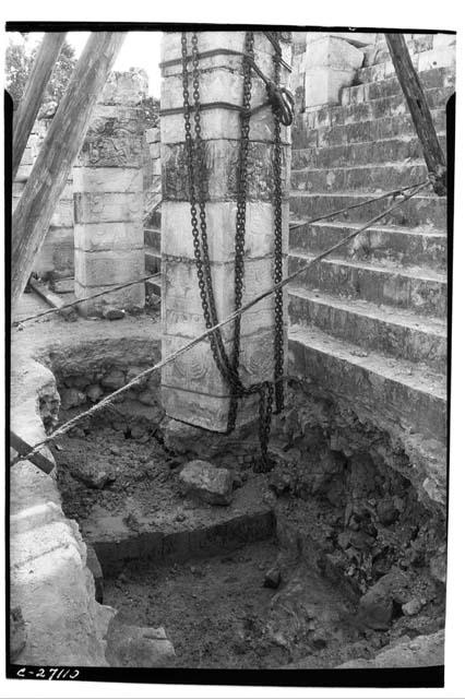 NW Col. View of the incenerary pit at base of stairway leading to T. of Warriors