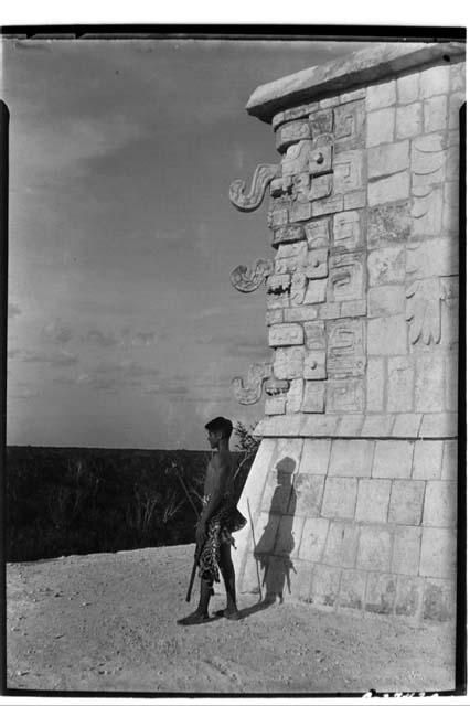 Native Maya boy at northwest corner of the Temple of Warriors