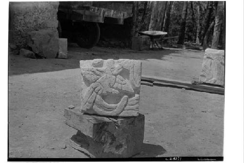 Sculptured stone from fill in Temple of Chac Mool