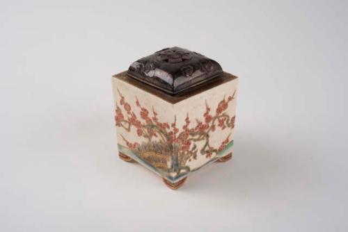 Ceramic box with metal lid