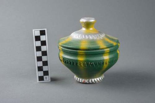 Terracotta container and lid, one of a pair