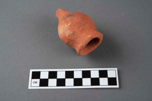 Terracotta object, one of a group of two.