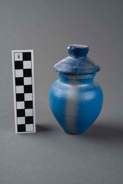 Terracotta container and lid, one of a pair