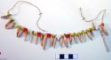 Necklace of animal teeth and glass beads
