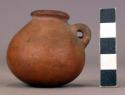 Ceramic, complete miniature jar, round bottom, constricted neck, 1 handle