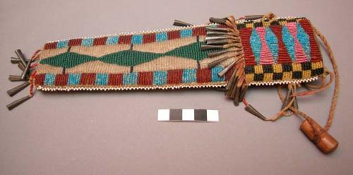 Beaded leather knife sheath - tin jingles;