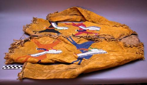 Cheyenne hide coat, pictographic beadwork