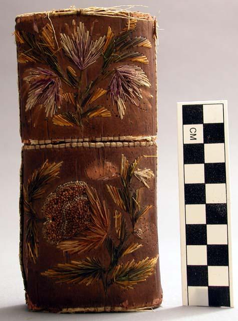 Tubular shaped box of bark trimmed in porcupine quill work