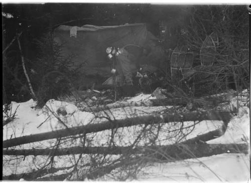 Man standing in Roland B. Dixon's camp