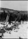 Herbert J. Spinden and George F. Will carrying packs