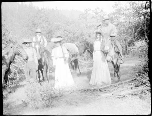 Group of people standing near Rio Nuevo