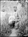 Man holding two children, near Rio Nuevo