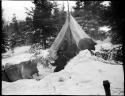 Man sitting in a tent