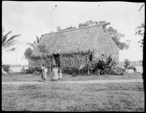 People walking in front of a house in Nausori