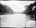 Man poling a boat along the Navua River