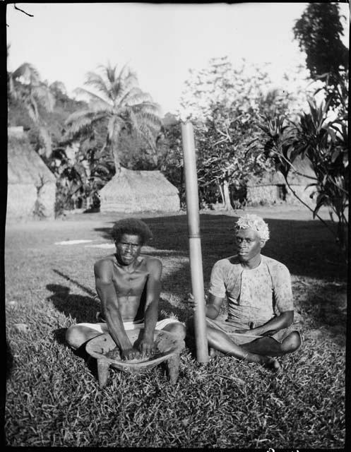 Two men making kava in Namuamua