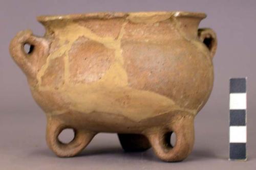 Pottery jar with loop handles and feet