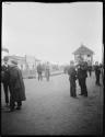 People standing near train station