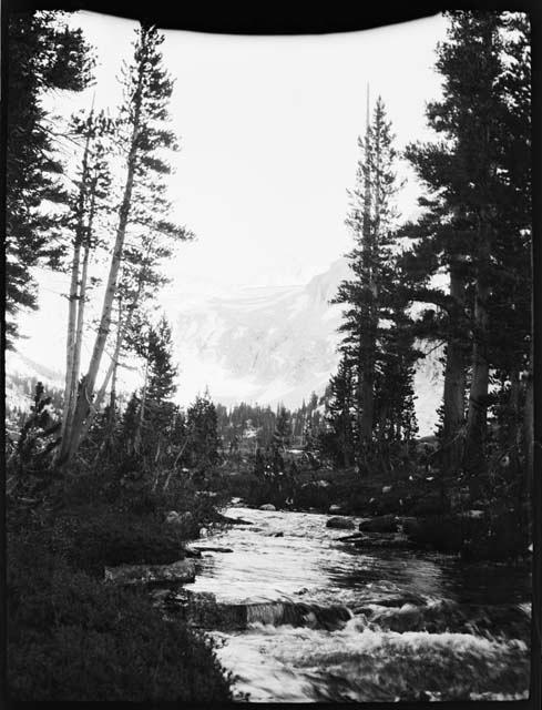 River, with a mountain in the background