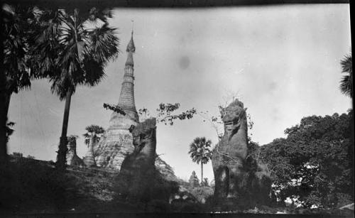 Statues, with Shwedagon Pagoda in the background