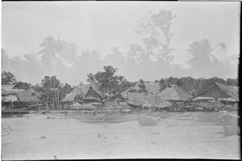 Buildings along shoreline (double exposure)