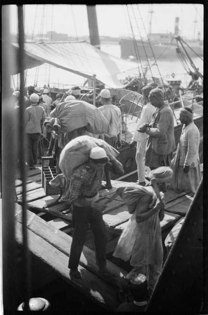 People loading a boat