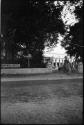 Person riding a bicycle in front of the "Imperial Hotel"