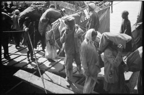 People standing on the deck of a ship