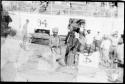 People standing in front of an Irrawaddy Flotilla Company boat (double exposure)