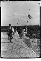 Native Maya boy in front of the Temple of Warriors