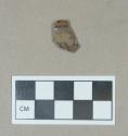 Ceramic, gray bodied green and mottled glazed earthenware rim sherd