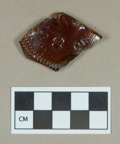 Glass, brown bottle base fragment