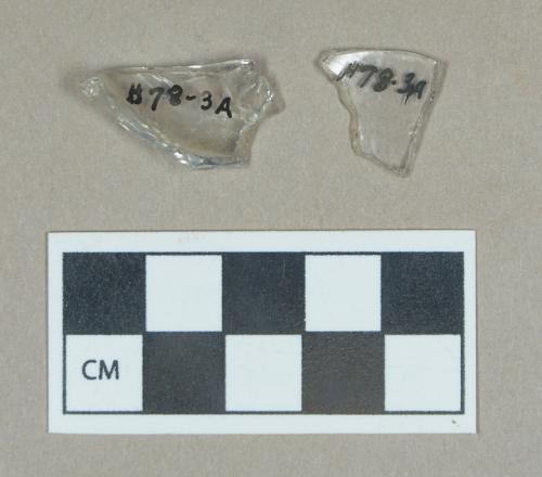 Glass, colorless curved body fragments