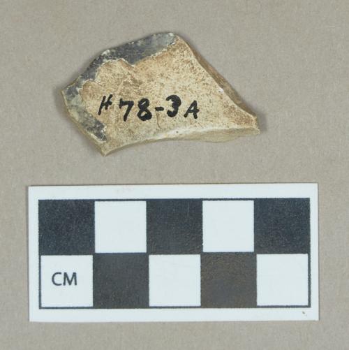 Ceramic, burned/weathered refined earthenware body sherd