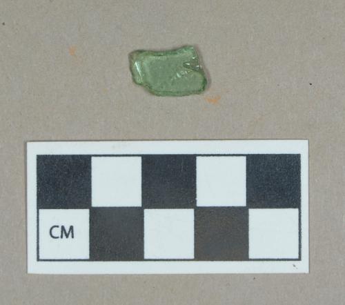 Glass, green curved body fragment