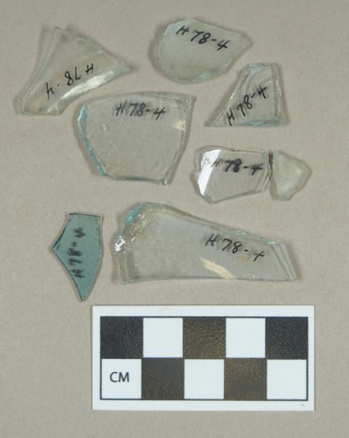 Glass, aqua curved body fragments